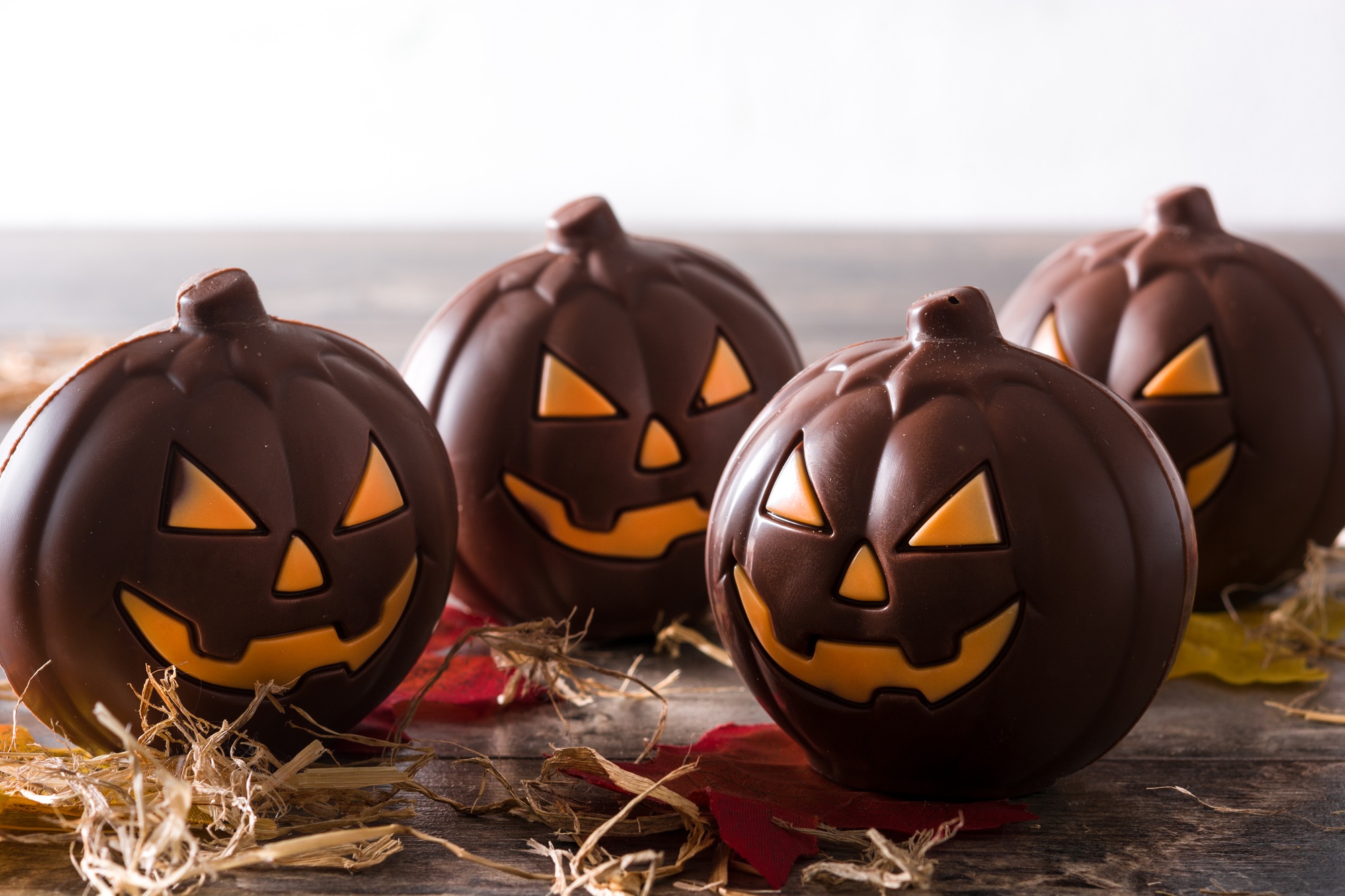 Chocolate pumpkins celebrating halloween with autumn decorations