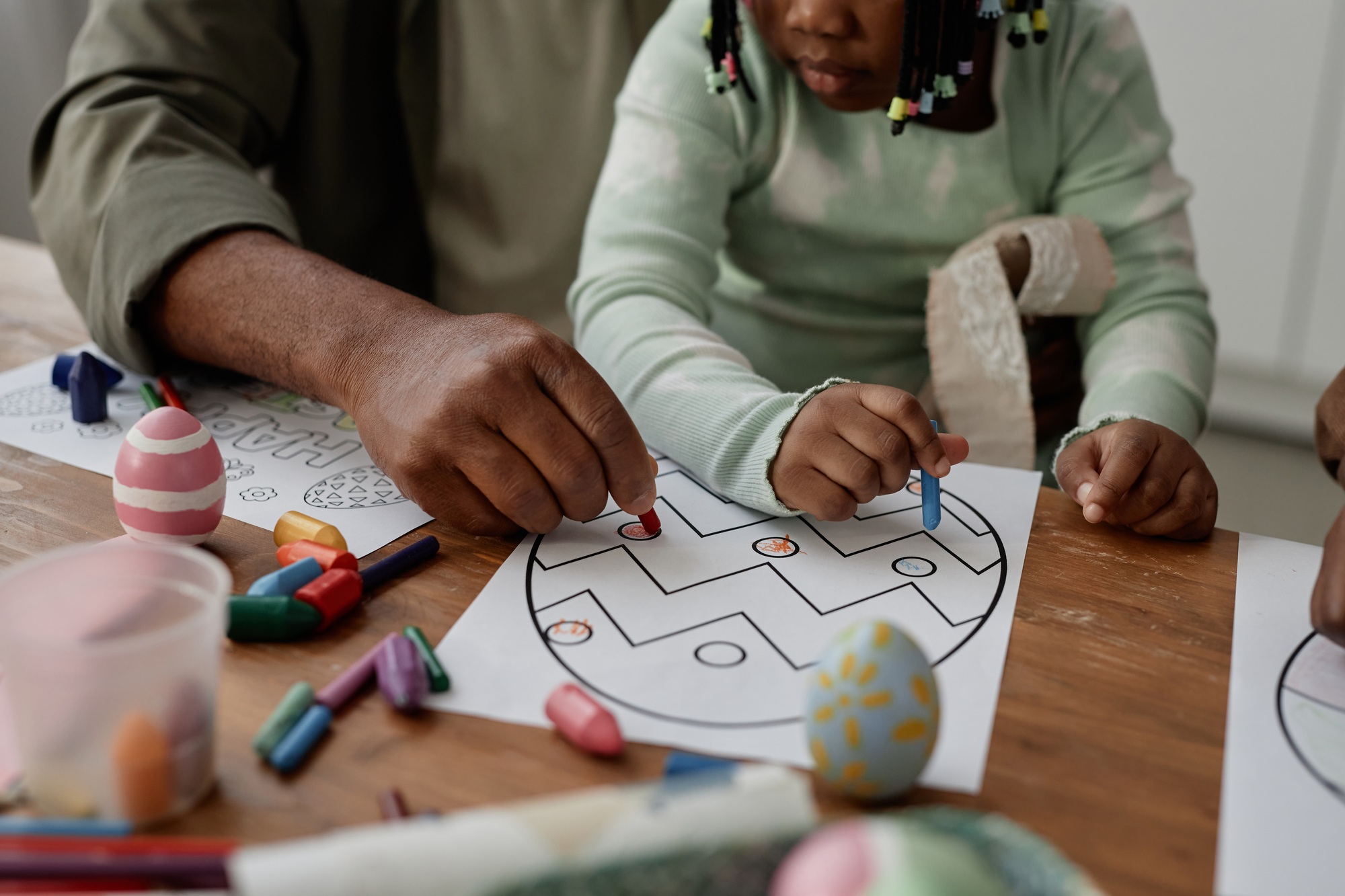 Crafting Easter Eggs Drawing on Wooden Table