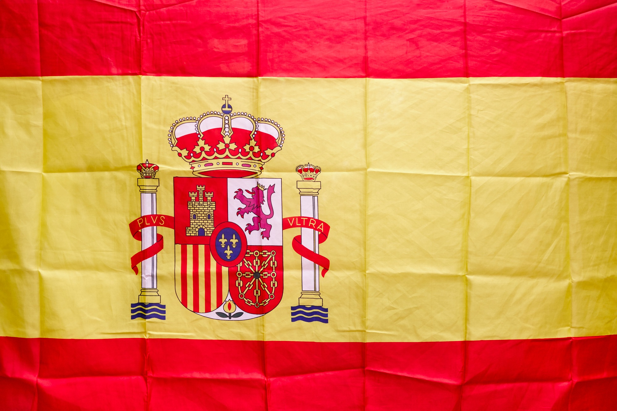 Spanish flag with shield and royal crown. Constitutional monarchy. Identity